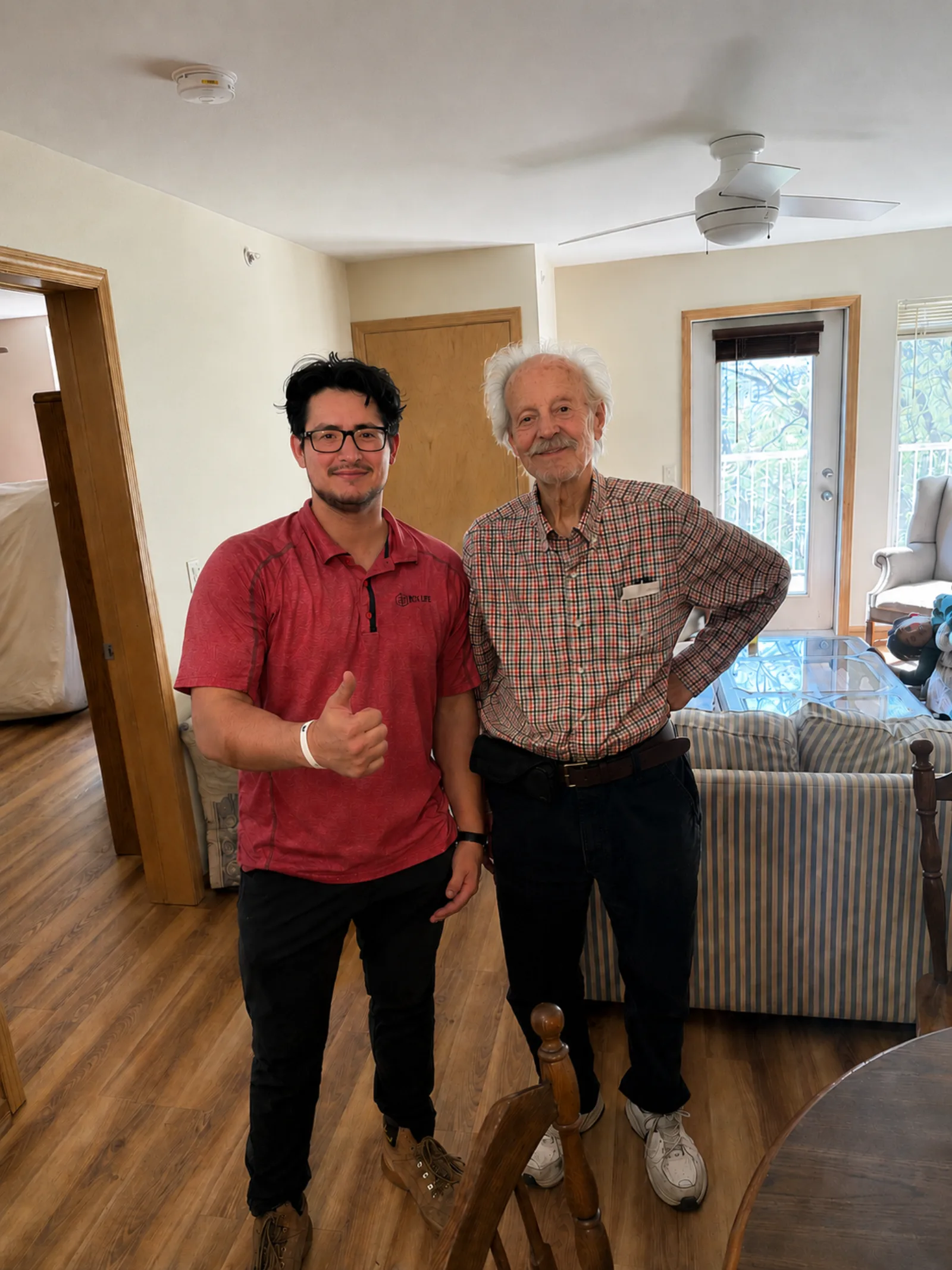 Jacob from Box Life Moving with a senior customer after a successful in-home move in Madison, WI